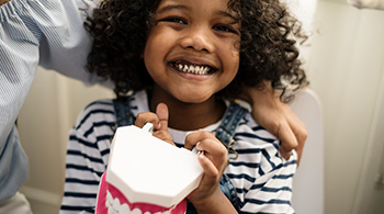 Little girl smiling happily